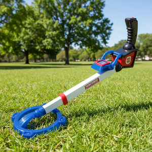 a toy metal detector in the grass