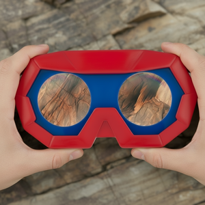 a pair of hands holding a red and blue goggles